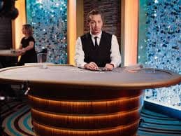 Live dealer blackjack table with multiple-camera feed